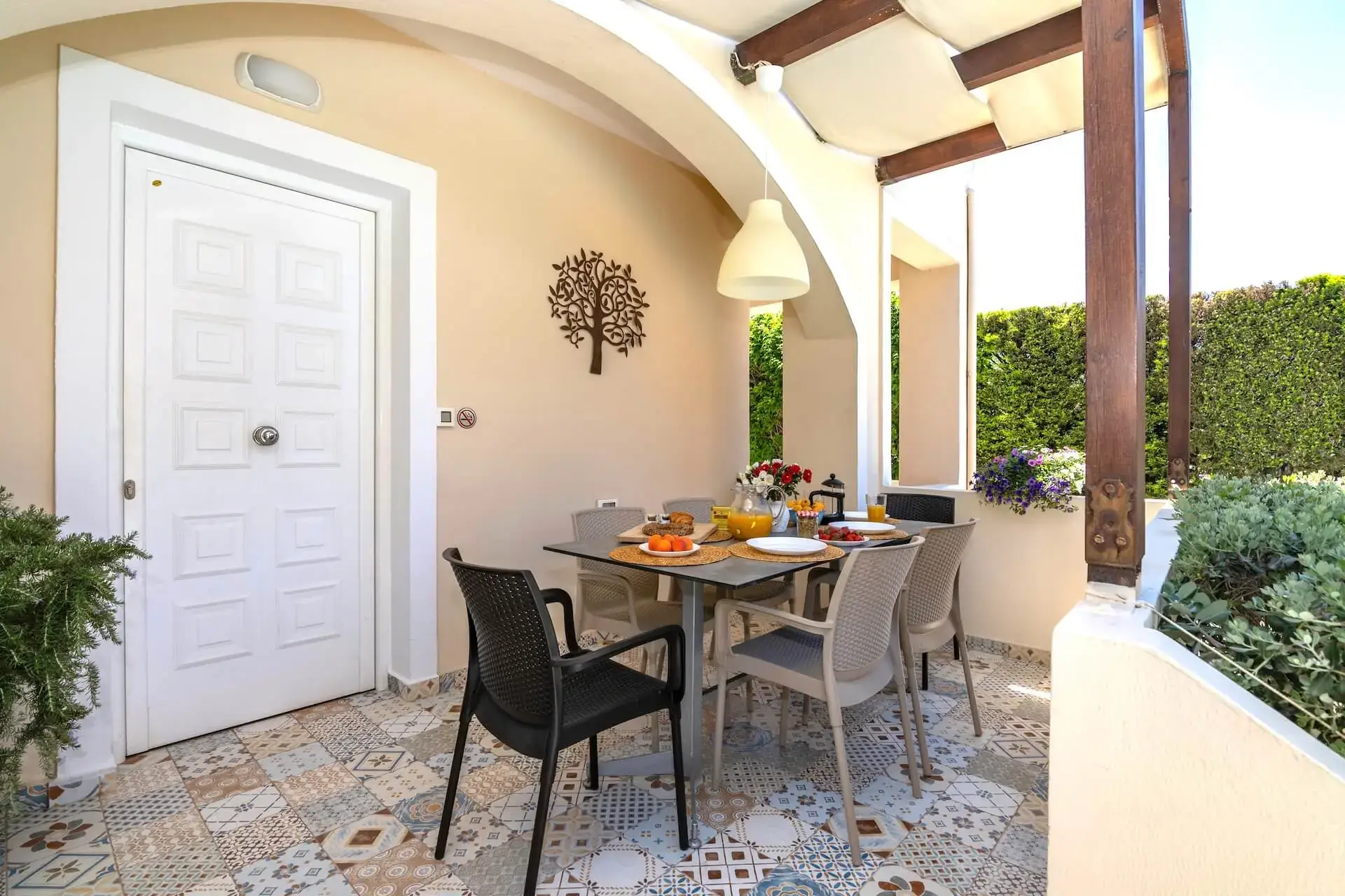 Outdoor dining area with BBQ grill